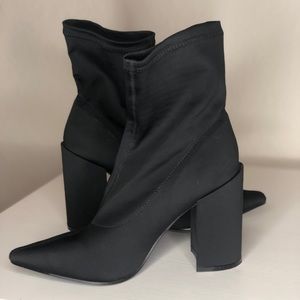 Black pointed toe ankle booties
